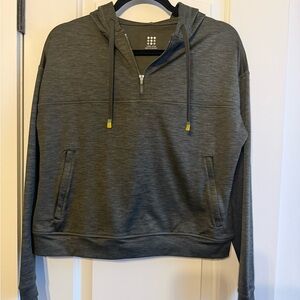 Women’s Title Nine dark green/gray quarter zip hoodie.